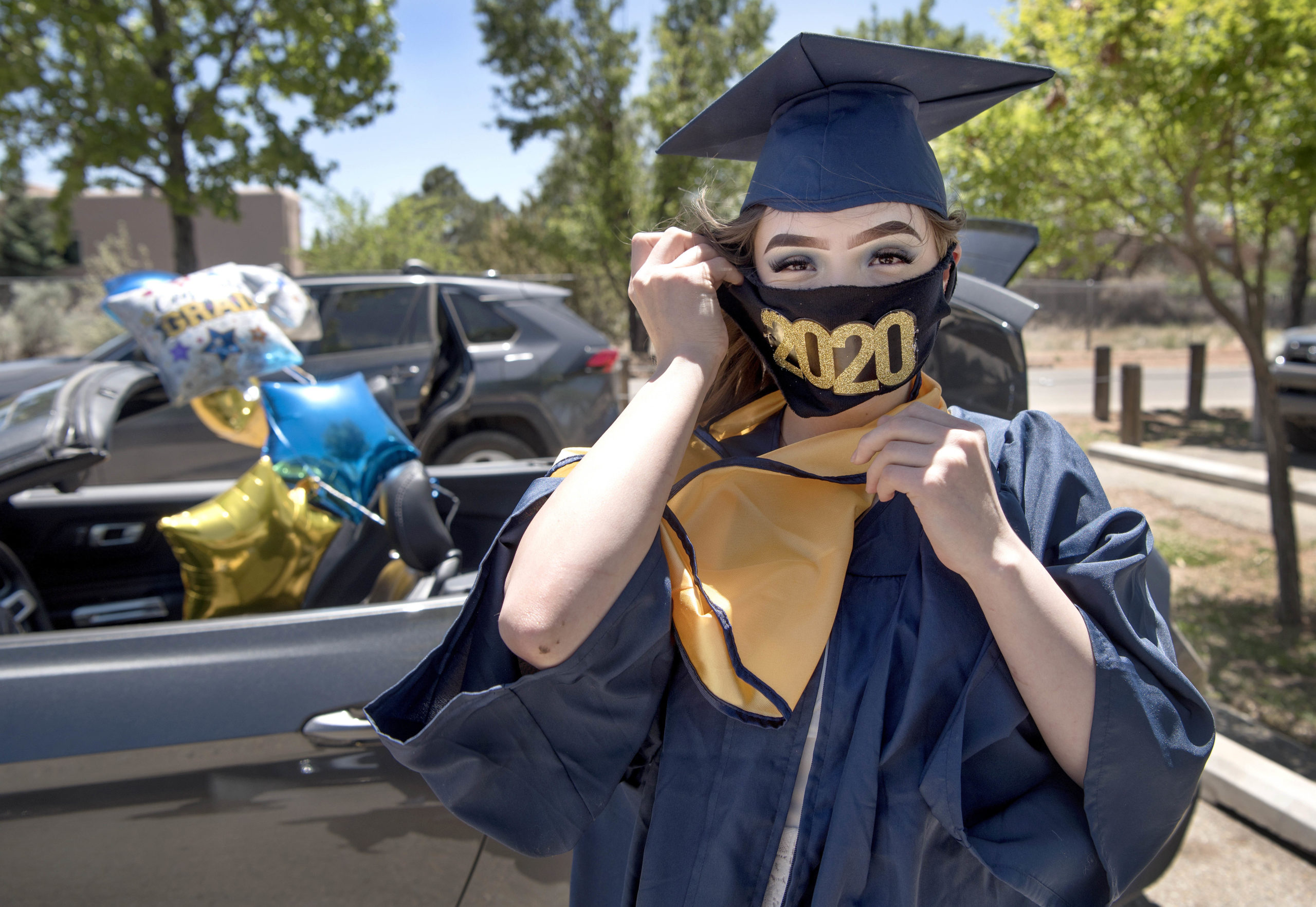 Savannah Torres Sisneros, 16, before the start of her graduation parade at Santa Fe High School, New Mexico