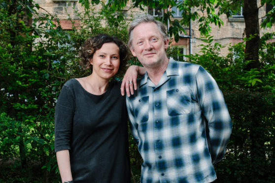 Douglas Henshall with playwright wife Tena Stivicic in their back green last week