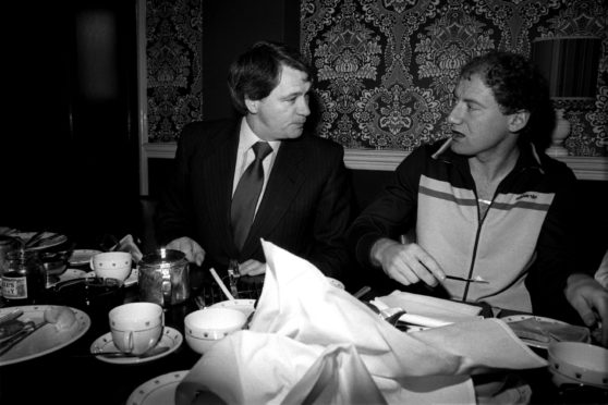 Alan Brazil enjoys a pre-match meal with Ipswich Town manager, Bobby Robson, back in February, 1982