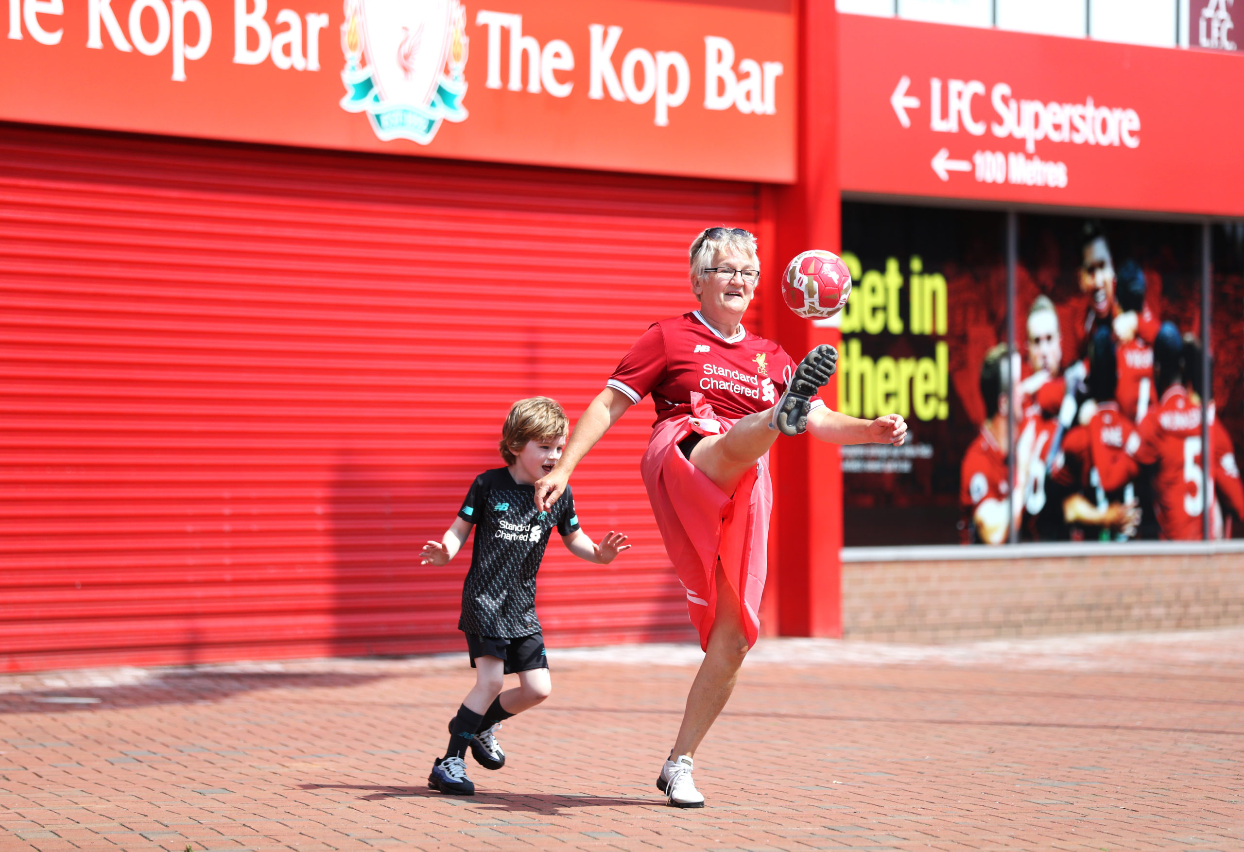 Thirty years on from Kenny Dalglish lifting the league trophy, generations of Liverpool fans were celebrating outside Anfield, some more energetically than others
