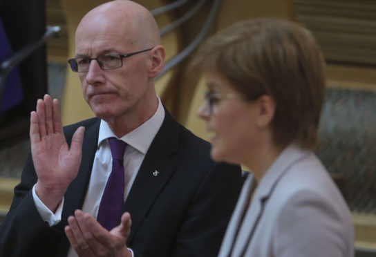 Nicola Sturgeon and John Swinney during First Minister’s Questions last week
