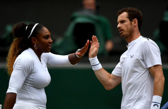 Andy on court with doubles partner Serena Williams