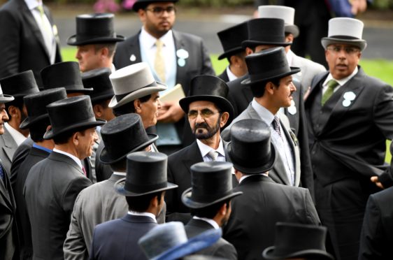 Sheikh Mohammed, centre at Royal Ascot last June