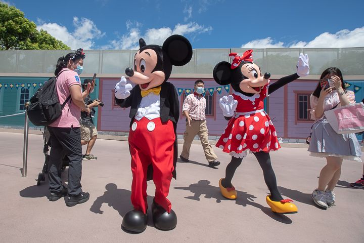 Mickey and Minnie greet visitors as Hong Kong Disneyland reopens