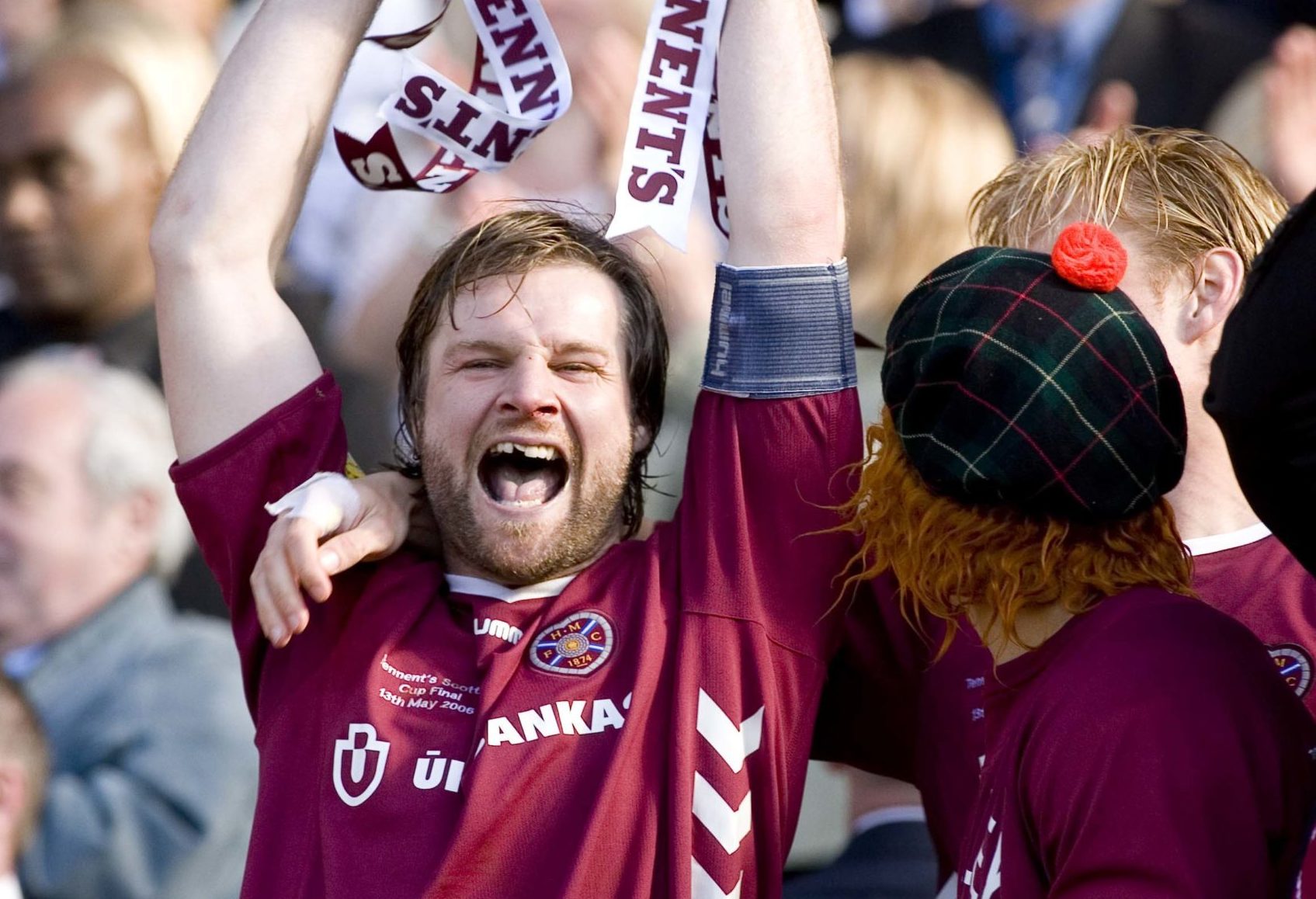 Steven Pressley lifts the Scottish Cup for Hearts in 2006