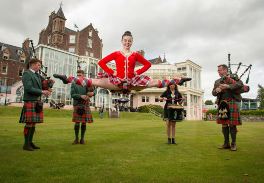 (l-r) Charlie, Richard, Louisa and Dad Stephen Leckie with award winning  dancer Ellie Closs (15) from Crieff