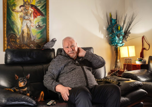 Jim Hendry relaxes at home in Glasgow after the lung cancer trial saved his life