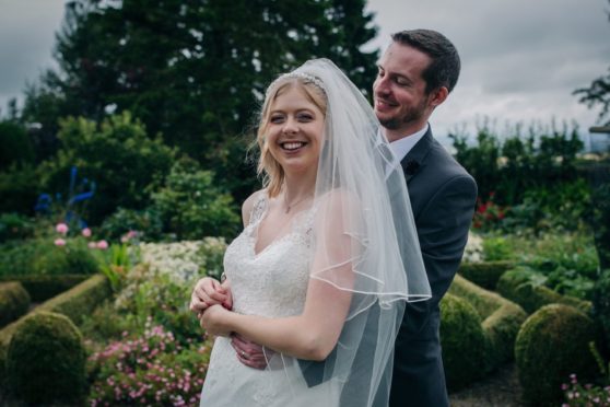 Helena Leslie and John Scott get happily married at Highfield House, Kirknewton, after travelling 340 miles from their home in Northampton for crucial ceremony