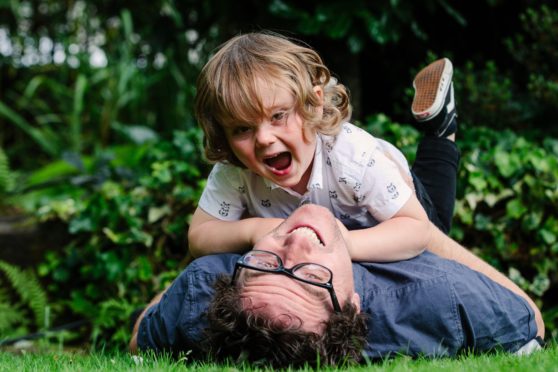 Journalist Martin Watt and son Ollie, two