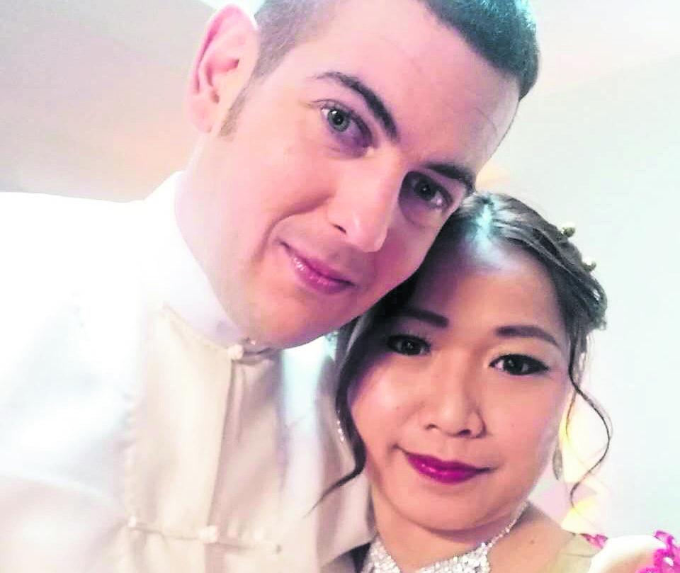 Ramsay Urquhart and his wife Pan Ei Phyu on their wedding day in Myanmar