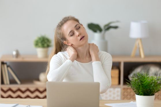 Incorrect posture while hunched over a laptop is causing back problems for many of us