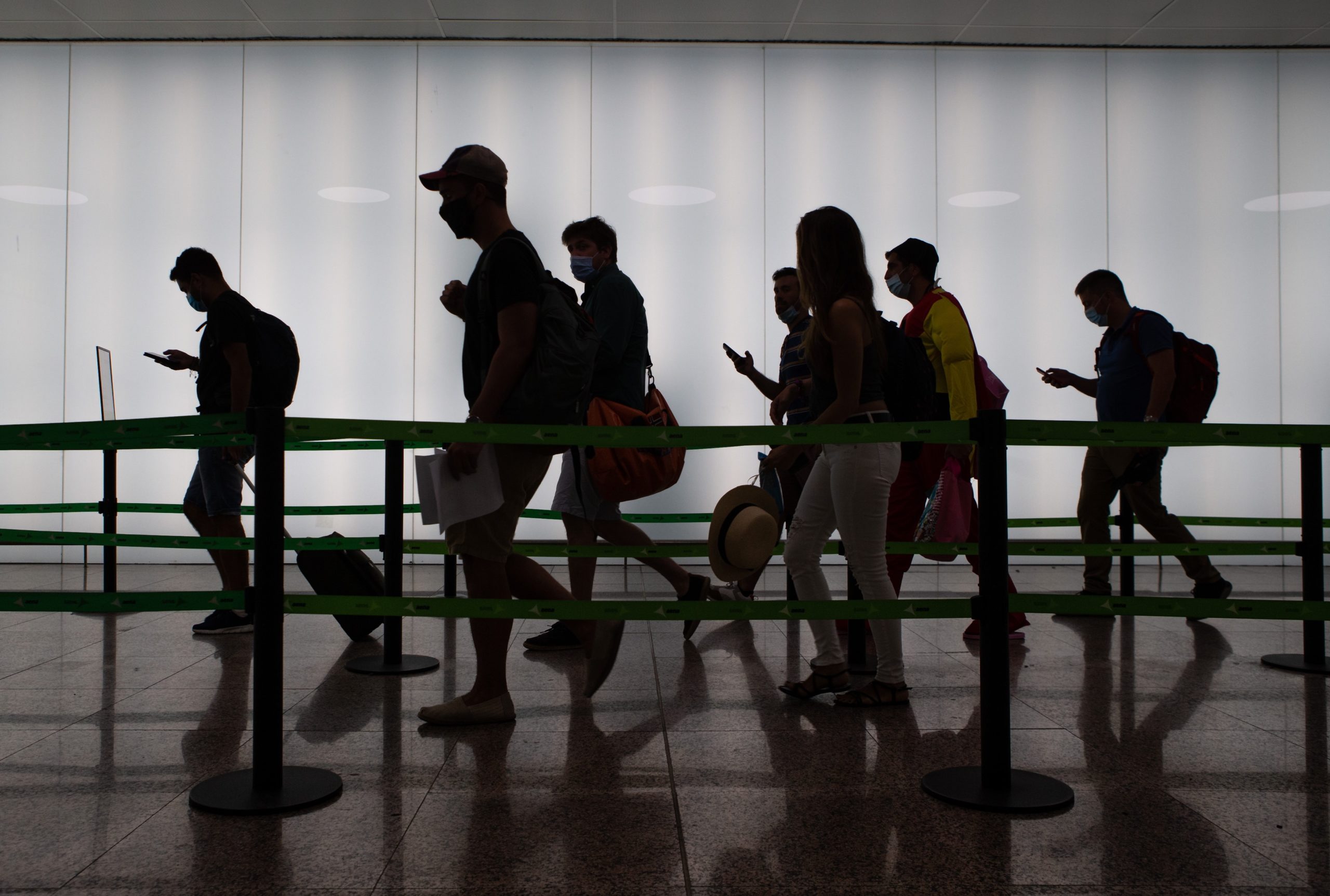 Travelers walk through Terminal 2 of the Josep Tarradellas Barcelona-El Prat Airport