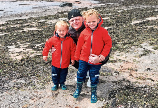 Alisdair Cameron with his two boys, Leo and Joe