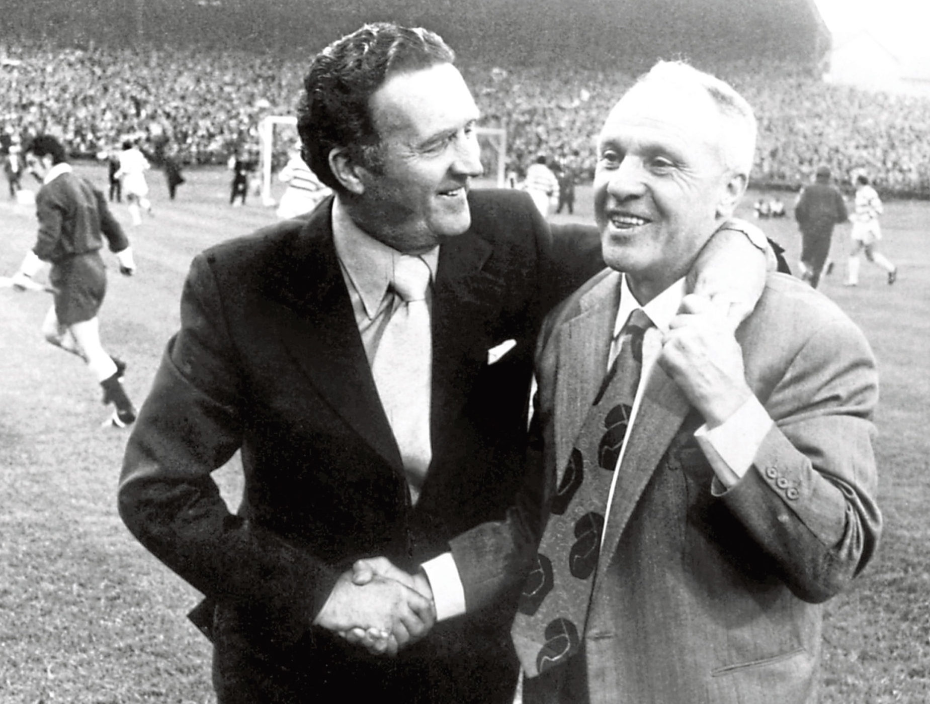 (L-R) Celtic manager Jock Stein renews his acquaintance with Liverpool manager Bill Shankly before the match.