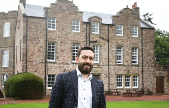 Colin Frame outside Shieldhill Castle