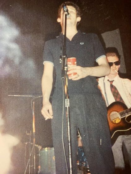 Pogues in the early days worked the Scottish circuit very hard to gain success, including places like Mukky Duck in Shotts. Shane McGowan in full flow.c. John Welsh