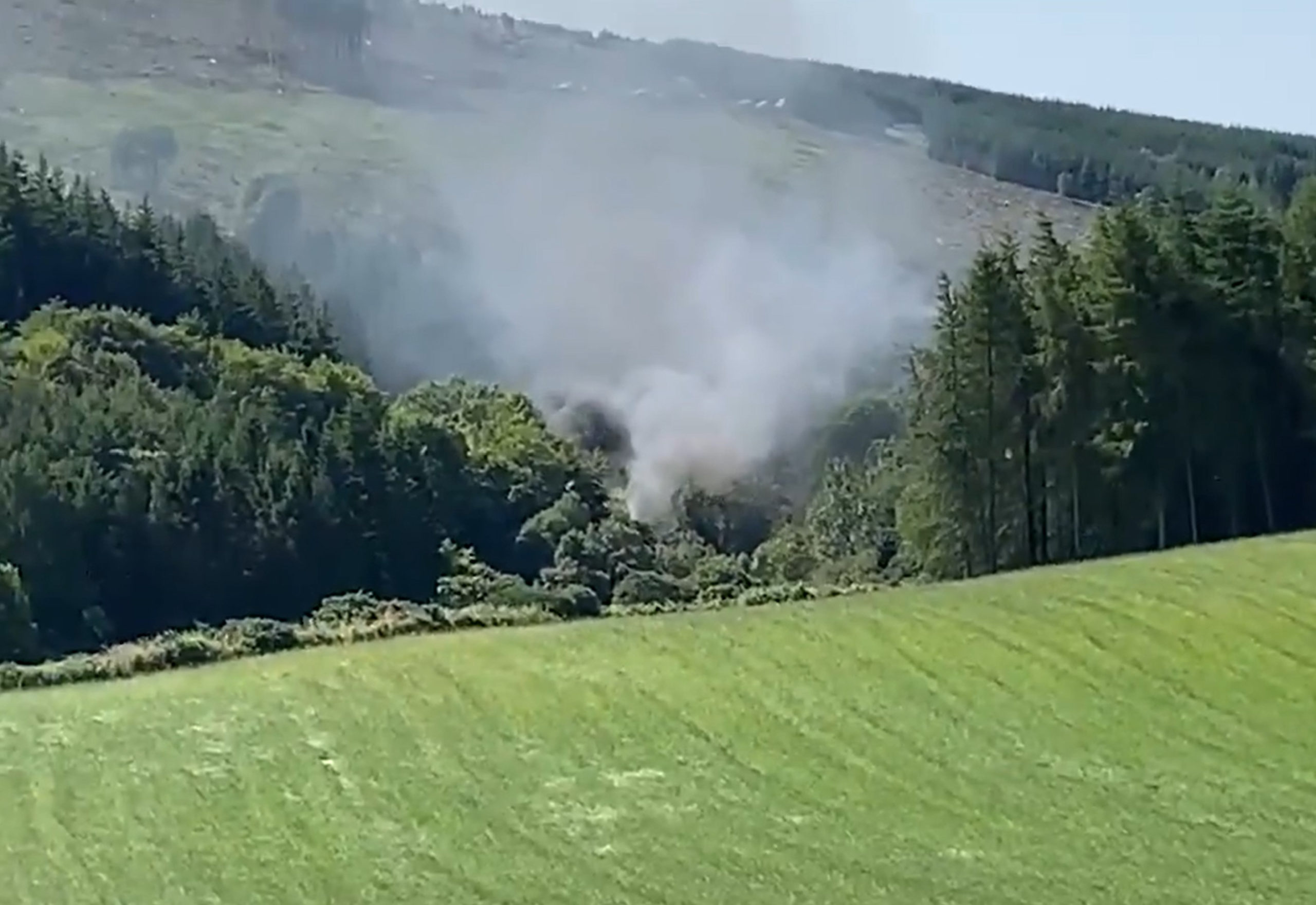 Smoke billowing from the train near Stonehaven, Aberdeenshire