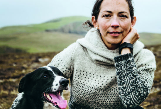 Fair Isle knitwear designer and author Mati Ventrillon with faithful sheepdog Lola