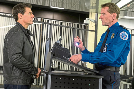 Author Lee Child enjoying a cameo appearance with Tom Cruise in 2016 movie Never Go Back, based on his book