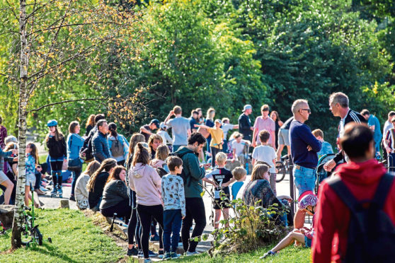 People enjoy the sun at Kelvingrove Park, Glasgow yesterday