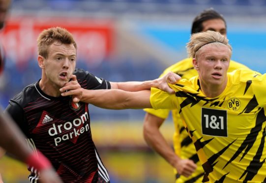 George Johnston gets one in the face from Erling Haaland during Feyenoord’s 3-1 friendly win over Borussia Dortmund three weeks ago