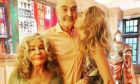 Connery’s granddaughter Saskia gives him a kiss in a picture posted on Instagram on his final birthday 
on August 25 this year, alongside 
wife Micheline