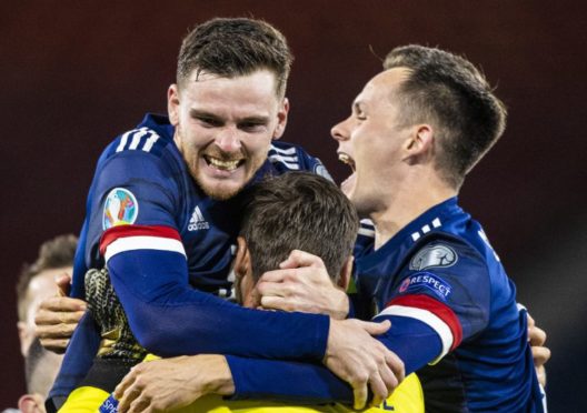 Andy Roberston and co. celebrate reaching the Euro 2020 Play-Off Final , after the dramatic penalty shoot over Israel.