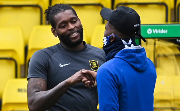 Livingston's Jay Emmanuel-Thomas (L) and Kilmarnock's Aaron Tshibola