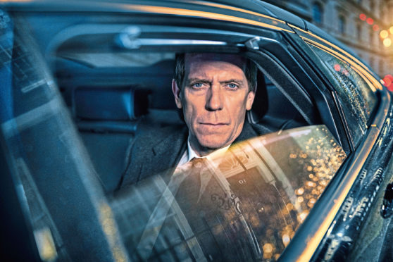 Hugh Laurie as up-and-coming MP Peter Laurence in political thriller Roadkill