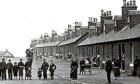 Villagers outside the cottage homes, known as raws, like the one Jock Findlay lived in, in Oakbank, East Calder in 1910
