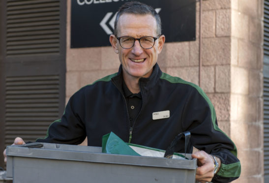 Brian Irvine at his present-day job, working in the food department at the Marks & Spencer store in Inverness