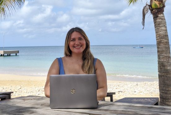 Catherine working remotely in Anguilla.
