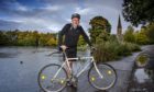 Paul English with his uncle’s old bike at Queen’s Park, Glasgow
