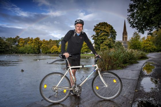 Paul English with his uncle’s old bike at Queen’s Park, Glasgow