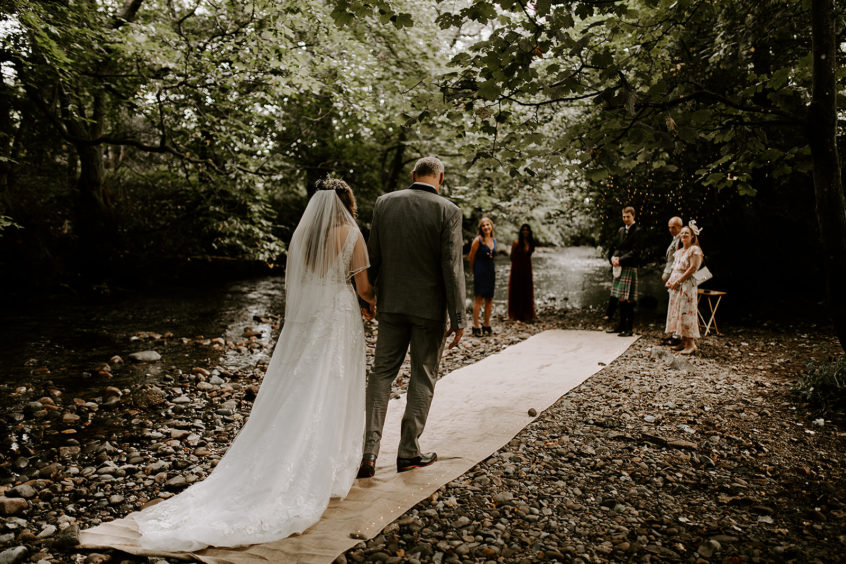 The pair created a special 'aisle' in the woodland riverbank, and were the first couple to ever be married in this spot.