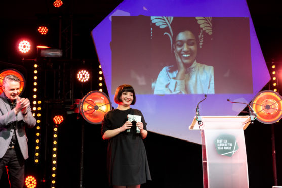 Nova watches as manager Sof Staune accepts the award on stage