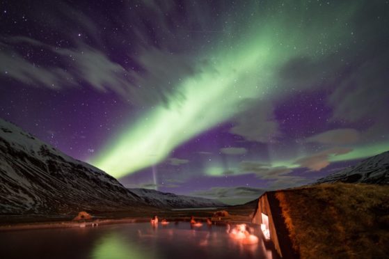 Watching the Northern Lights from the outdoor pool at Deplar Farm