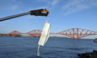 A surgical mask found during a litter cleanup near the Forth Bridge
