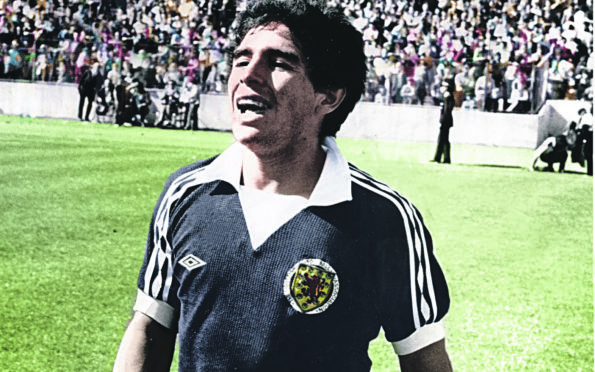 In this picture probably not seen since it appeared on the back page of The Sunday Post on June 3, 1979, and colourised by The Post’s design editor John Wilkie, Maradona wears a Scotland jersey after swapping shirts with Arthur Graham. 
Our caption was true then, true today: “Now, if only he could change his name to Mac-Adona: Here’s a sight that would gladden all Scottish hearts – Argentina’s new 18-year-old wonder boy Diego Maradona in a Scotland jersey at the end of yesterday’s match.”