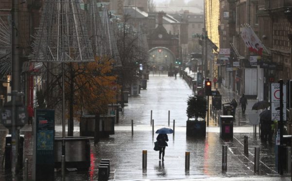 A quiet Buchanan Street in Glasgow on the first day after eleven local council areas in Scotland moved into Level 4 restrictions