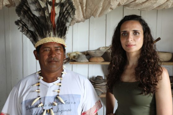 Archaeologist Ella Al-Shamahi with chief Anildo Kokama of the Kokama community, who hopes archaeology can help his people's claim to ancient tribal territory on the river Amazon in Brazil.