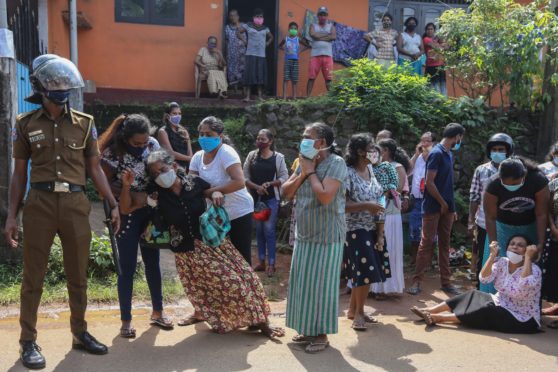 Sri Lankan families plead for the lives of relatives amid riots in Mahara Prison, Colombo, in November 2020. Eight inmates were killed and 40 injured when prison and police officials opened fire at rioters