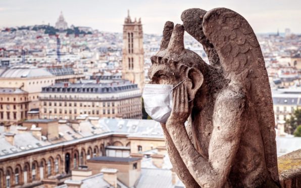 Masked gargoyle at Notre-Dame, Paris