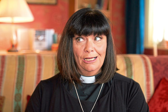 Dawn French once again dons her dog collar for The Vicar Of Dibley