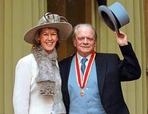 Sir David Jason and his wife Gill after collecting his knighthood.