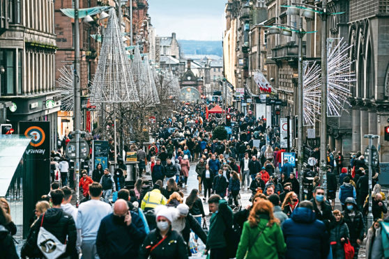 Buchanan Street in the centre of Glasgow was mobbed with shoppers yesterday on the last Saturday before Christmas.