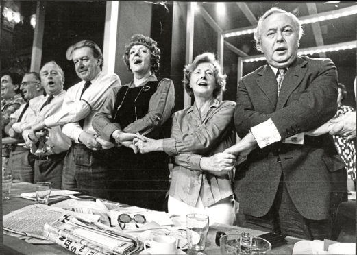 Harold Wilson and Barbara Castle, right, lead the chorus of Auld Lang Sang at Labour                     Party conference in 1973.