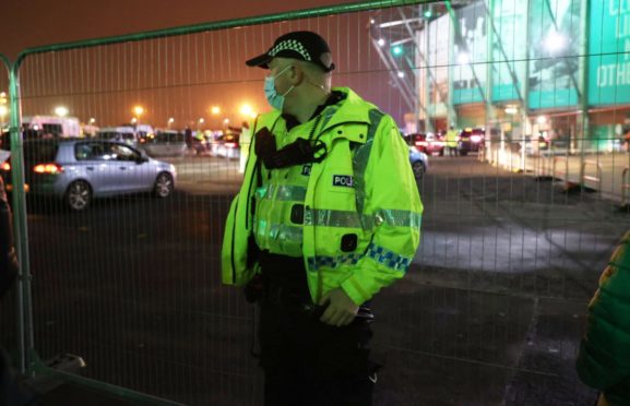 Police on duty at Celtic Park during fan protests