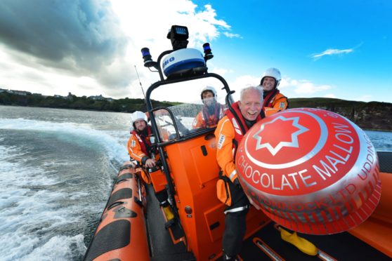 Sir Boyd Tunnock and crew aboard St Abbs Lifeboat