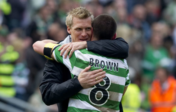 Johan Mjallby with skipper Scott Brown in 2010